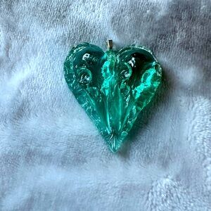 Gorgeous one of a kind, handcrafted bird skull heart necklace